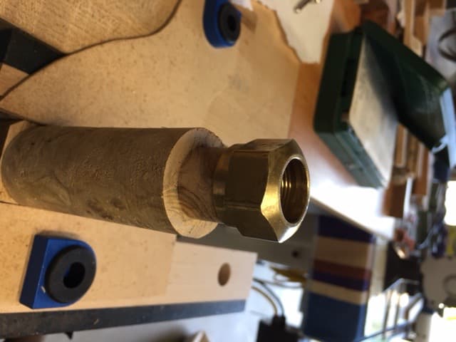 Measuring the Compression Nut Diameter and Depth and Marking on the Spindle, Turning for the Nut to Be Threaded On.