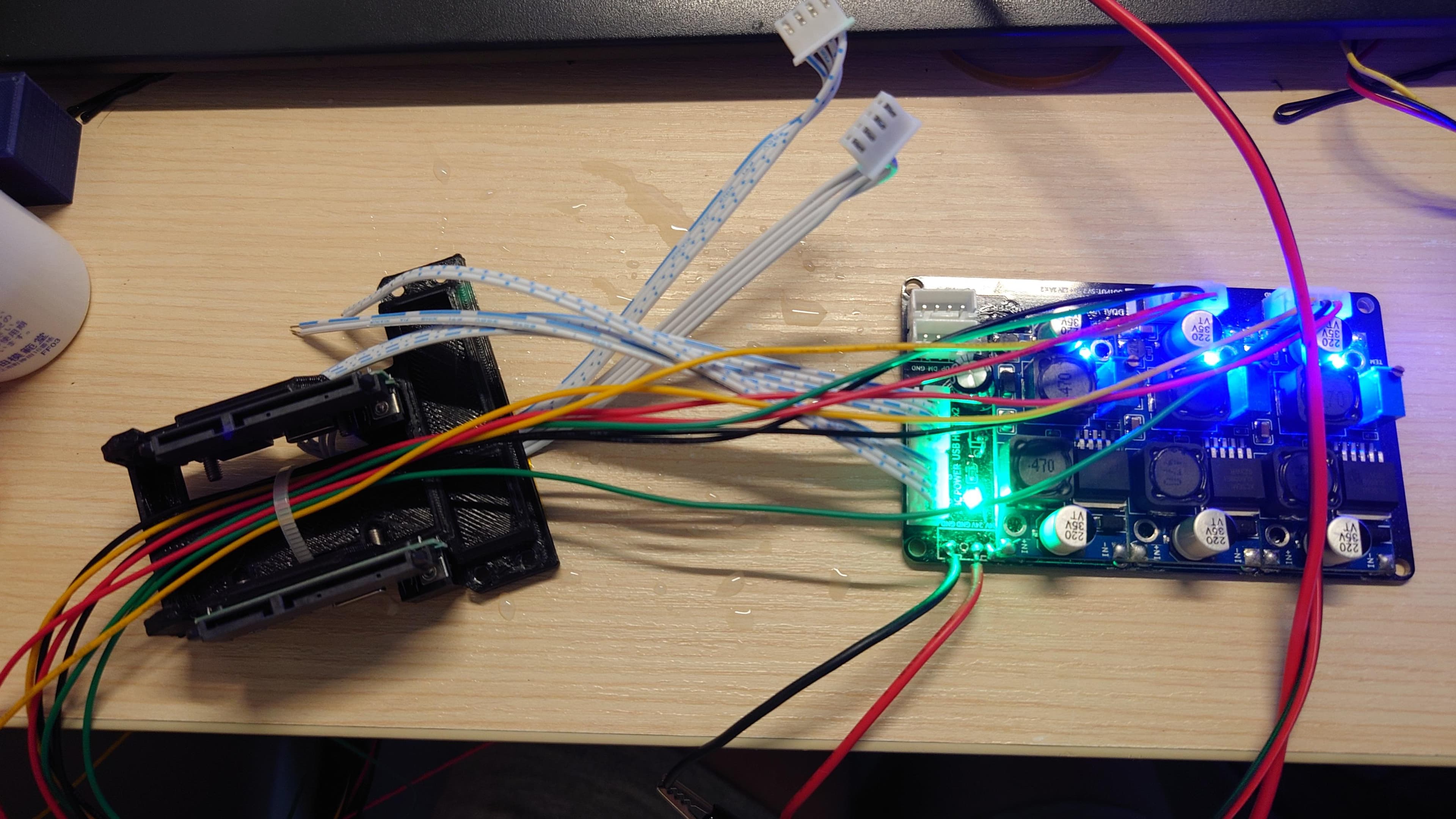 Tear Down the SATA to USB Adapter and Assembly the Adapter Arm