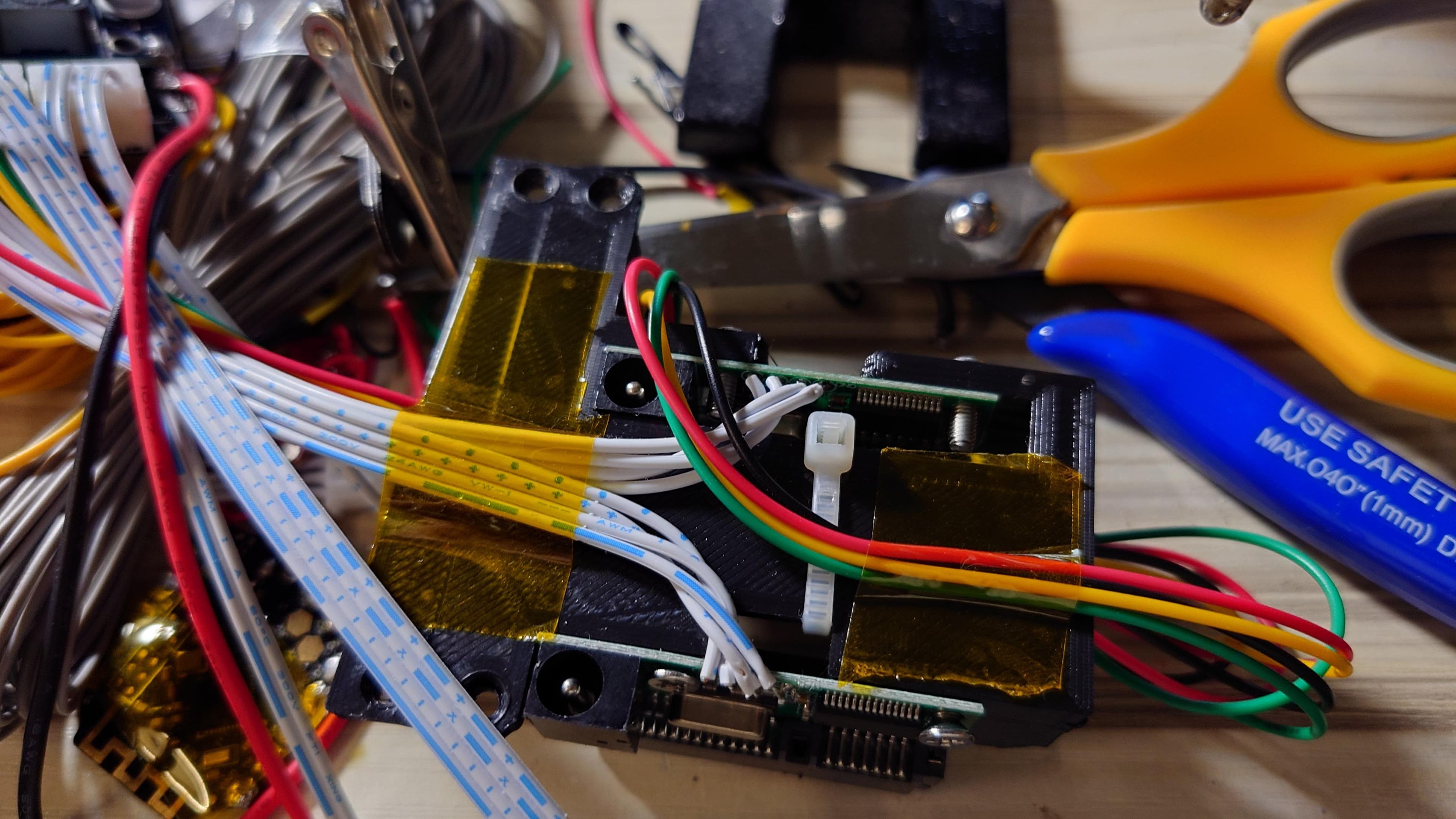 Tear Down the SATA to USB Adapter and Assembly the Adapter Arm