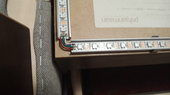Installation of addressable LED strip in profile and soldering of contacts