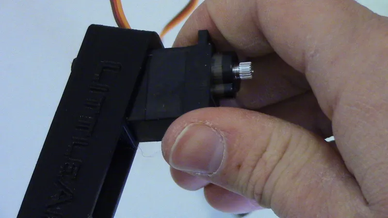 Insert Servos Into Upperarm