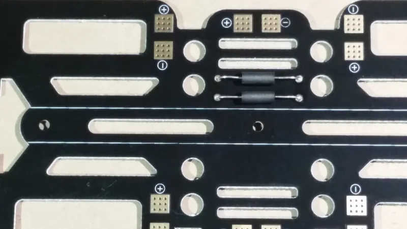 Solder Ferrite Beads to the Power Distribution Board