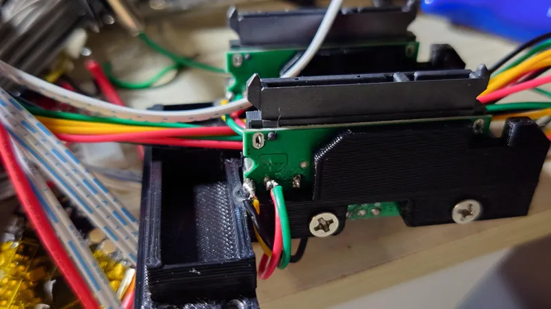 Tear Down the SATA to USB Adapter and Assembly the Adapter Arm