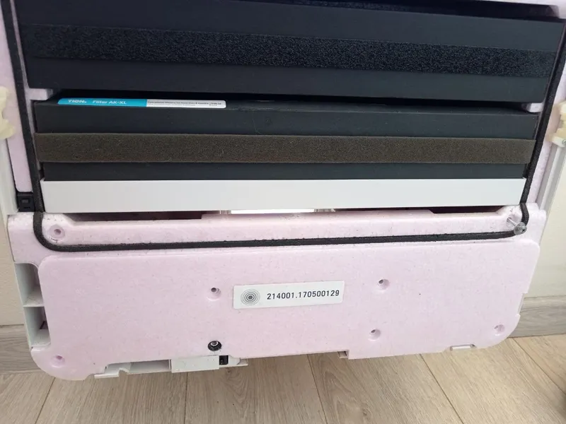 Unscrewing the bottom cover to access the control board